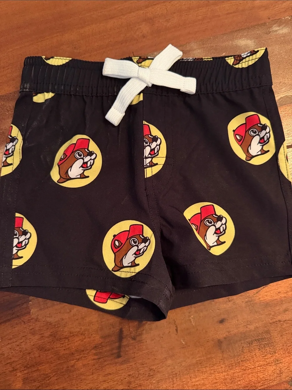 Buc-ee’s baby swim trunks 6-9 mo